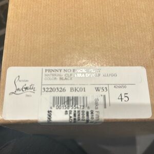 Pristine never worn Louboutin patent leather loafers.